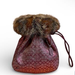 COMING SOON
Coach Vintage Wristlet-Like New